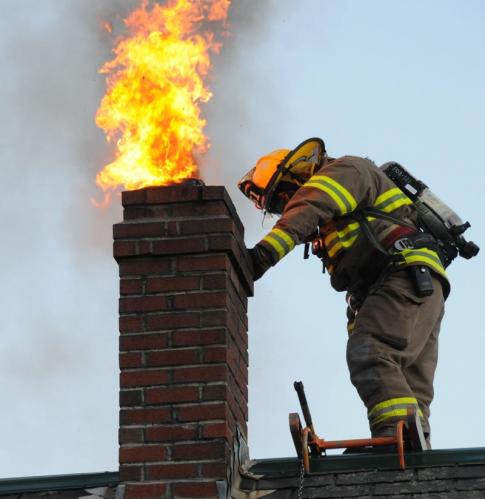 Picture of Chimney Fire Caused By Not Sweeping A Chimney